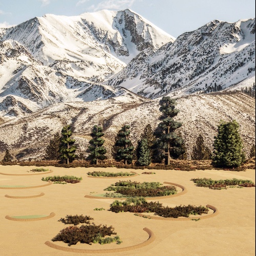 View of snowy mountain range with earth-based interventions in foreground.