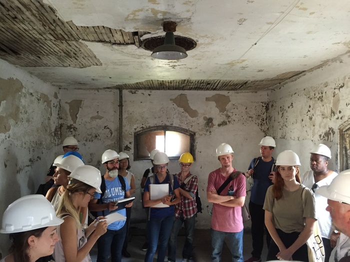 First year students working at Ellis Island hard hats.jpg
